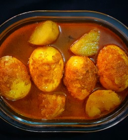 Dim Aloo Doi Jhol ( Egg Potato cooked in curd based curry)