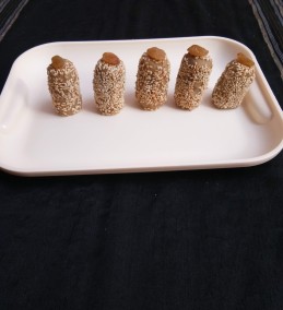Roasted Sesame Seeds Coated Sattu Peanut Powder Pinni Recipe
