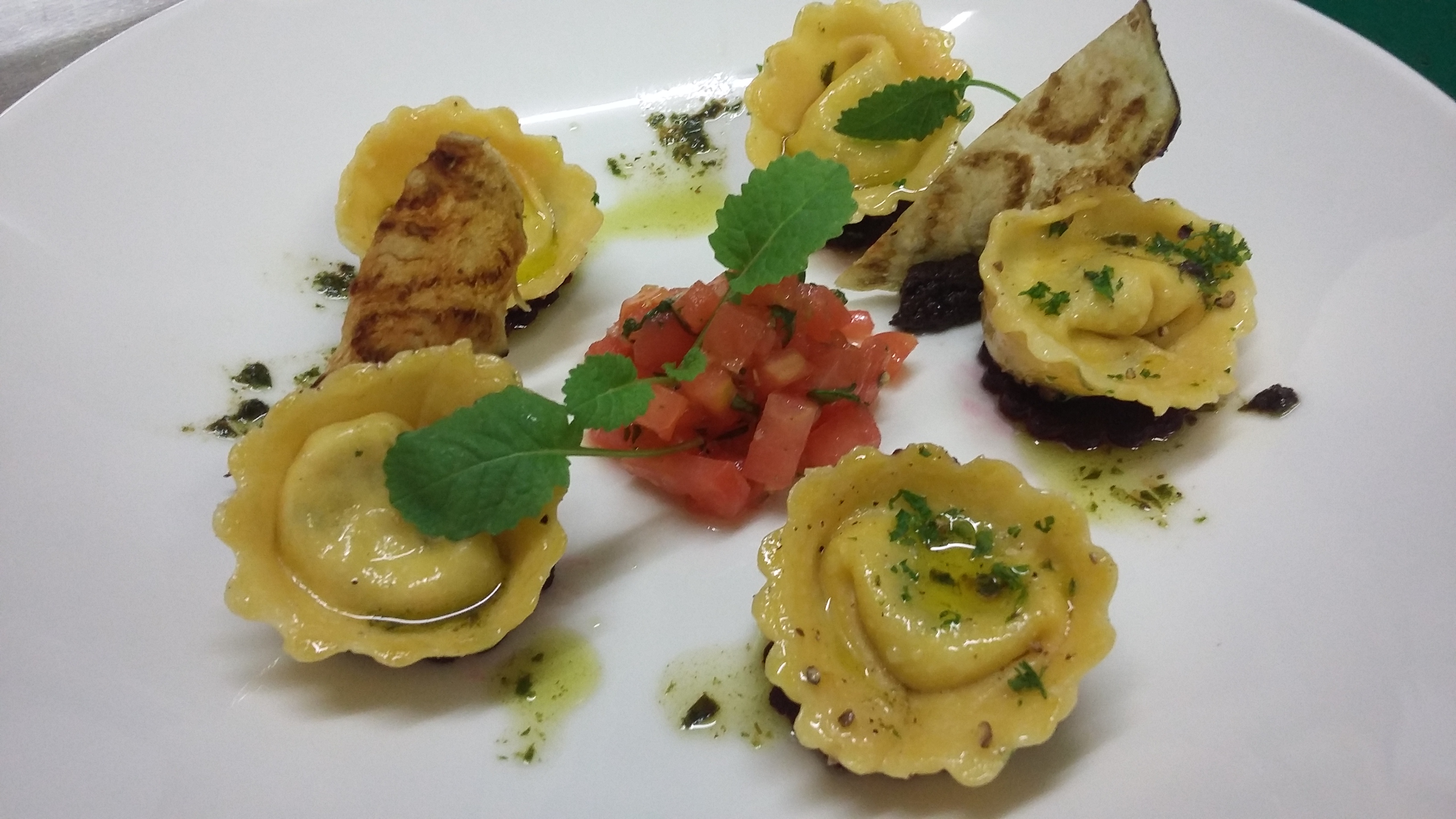 Cappelletti pasta, Tossed in Basil Pesto and served with tomato salsa ...